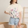 16849521394289045188_2048.jpeg Paz Floral T-Shirt – 'Peace Be With You' Garden Graphic Tee